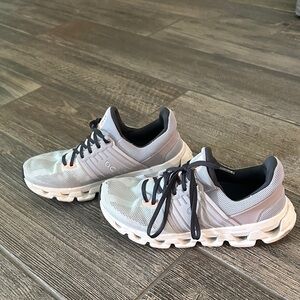 On Running Women's Blue and White Athletic Shoes